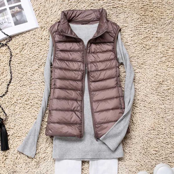 autumn white duck down women's short vest jacket sleeveless portable office lady women vests coat 2020 spring waistcoat female, Black
autumn white duck down women's short vest jacket sleeveless portable office lady women vests coat 2020 spring waistcoat female, Black