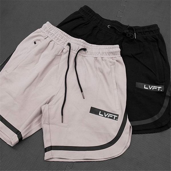 men's shorts fitness international sports running loose stretch pure cotton breathable quick drying large capris, White;black
men's shorts fitness international sports running loose stretch pure cotton breathable quick drying large capris, White;black