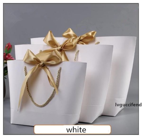 gold present box for pajamas clothes books packaging gold handle paper box bags kraft paper large size gift bag with handles decor
gold present box for pajamas clothes books packaging gold handle paper box bags kraft paper large size gift bag with handles decor