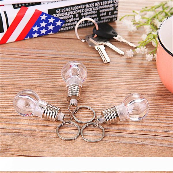 RGB LED Bulb Shaped Ring Keychain Flashlight Key Ring Keychain Lamp Crystal Car Key Chain Key Holder
RGB LED Bulb Shaped Ring Keychain Flashlight Key Ring Keychain Lamp Crystal Car Key Chain Key Holder
