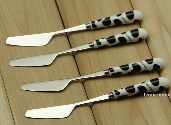 wholesale dinnerware sets leopard print butter knife stainless steel cheese knife with black brown ceramics handle
wholesale dinnerware sets leopard print butter knife stainless steel cheese knife with black brown ceramics handle