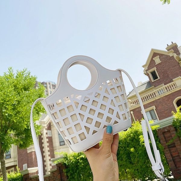 2020 hollow mother korean fashion portable bucket messenger bag holiday beach shoulder strap shoulder strap bag
2020 hollow mother korean fashion portable bucket messenger bag holiday beach shoulder strap shoulder strap bag