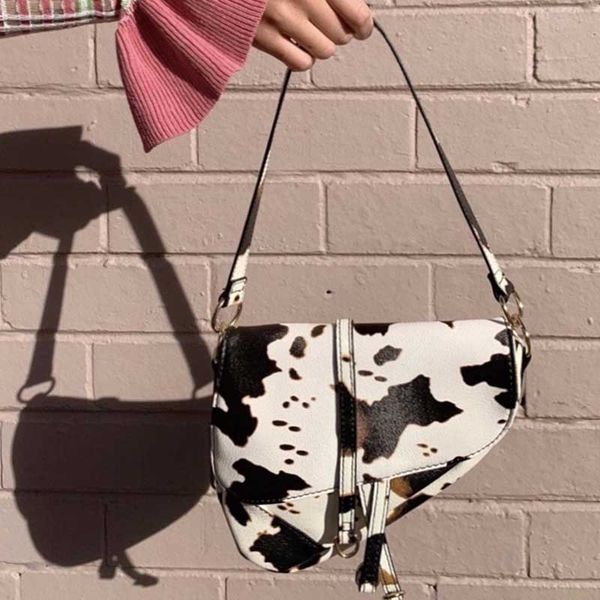 ретро корова шаблон мешок плечо женщины кожа pu сумка подмышки advanced design crossbody седло девушка магазины сумка bolso
ретро корова шаблон мешок плечо женщины кожа pu сумка подмышки advanced design crossbody седло девушка магазины сумка bolso