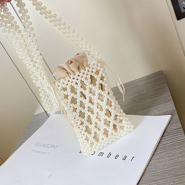 fairy pearl mobile phone bag female messenger mini bag 2020 new wild luxury handbags women bags designer beading pearl bucket 
fairy pearl mobile phone bag female messenger mini bag 2020 new wild luxury handbags women bags designer beading pearl bucket