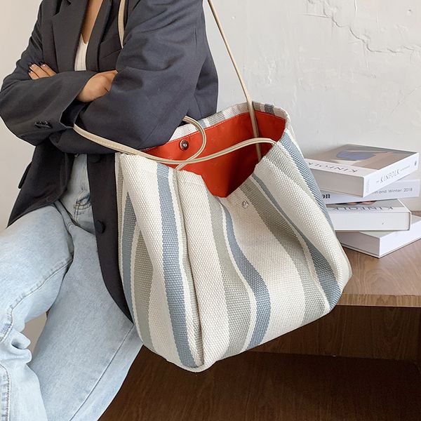 new korean design fashion large capacity canvas handbag & elegant bucket bag tote bag shoulder width 55cm height 32cm
new korean design fashion large capacity canvas handbag & elegant bucket bag tote bag shoulder width 55cm height 32cm