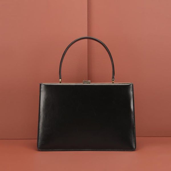 design leather bag ladies new fashion retro handbags european and american high-quality classic business briefcase 1002
design leather bag ladies new fashion retro handbags european and american high-quality classic business briefcase 1002