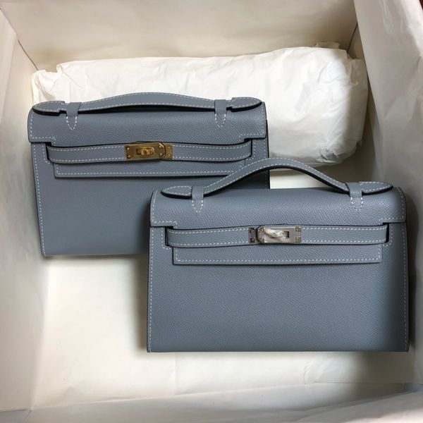 whosale handmade 22cm epsom leather design purse, black,whie color,wax thread, have both gold and silver hardware,fast dlivery
whosale handmade 22cm epsom leather design purse, black,whie color,wax thread, have both gold and silver hardware,fast dlivery