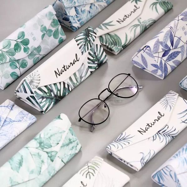 various styles of cute box jet-painted case glasses case folding big triangle glasses box, Blue
various styles of cute box jet-painted case glasses case folding big triangle glasses box, Blue