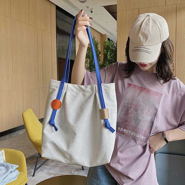 original design large capacity mummy bag 2020 fashion shoulder bag simple canvas geometric portable tote college student
original design large capacity mummy bag 2020 fashion shoulder bag simple canvas geometric portable tote college student