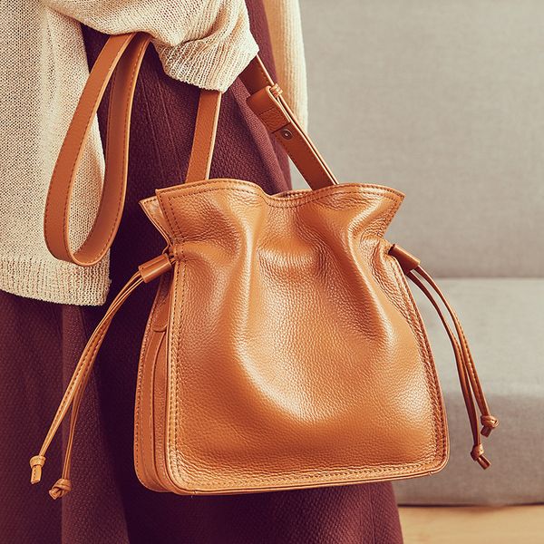 cowhide leather drawstring vintage lady shoulder bag solid color crossbody soft bucket bag
cowhide leather drawstring vintage lady shoulder bag solid color crossbody soft bucket bag