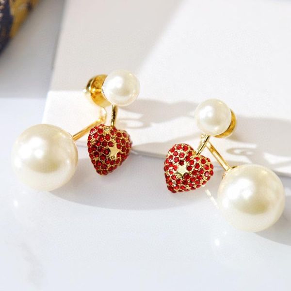c2003 double sided pearl ear stud fashion and high class european and american temperament heart - shaped red cubic zirconia eardrop, Golden;silver
c2003 double sided pearl ear stud fashion and high class european and american temperament heart - shaped red cubic zirconia eardrop, Golden;silver