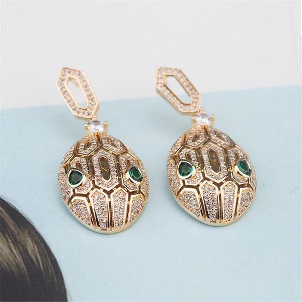luxury fashion earrings green eyes snake head design dangler earring women gold silver rose wedding earrings fine jewelry
luxury fashion earrings green eyes snake head design dangler earring women gold silver rose wedding earrings fine jewelry