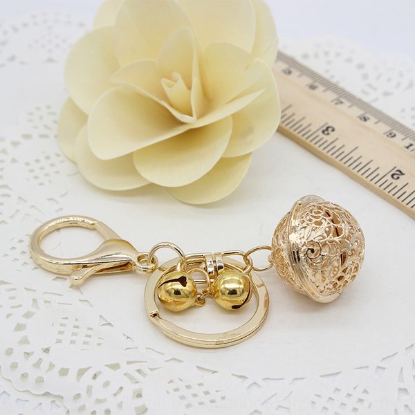 hollow-out zinc alloy key chain flower thousand bones bell palace bell pendant couple pendant small gift, Silver
hollow-out zinc alloy key chain flower thousand bones bell palace bell pendant couple pendant small gift, Silver