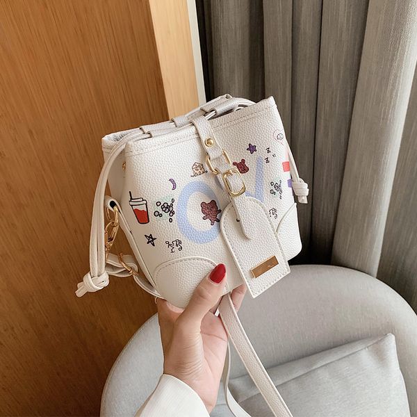 new french design fashion cartoon printed bucket bag handbag & elegant messenger bag shoulder width 14.5cm height 15.5cm
new french design fashion cartoon printed bucket bag handbag & elegant messenger bag shoulder width 14.5cm height 15.5cm