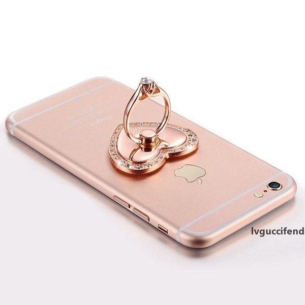 heart-shaped metal diamond grain finger ring holder stand mobile phone holder stand for ip huawei smart phone sticker
heart-shaped metal diamond grain finger ring holder stand mobile phone holder stand for ip huawei smart phone sticker