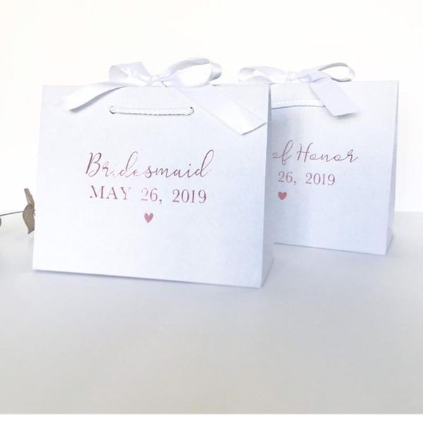 personalised white gift bag with ribbon.white bridesmaid gift bag. gold name flower girl bag rose gold bridal party gifts
personalised white gift bag with ribbon.white bridesmaid gift bag. gold name flower girl bag rose gold bridal party gifts