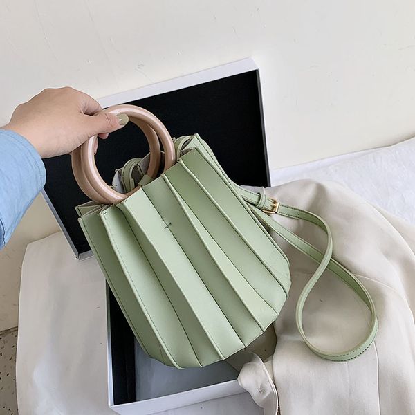 women ruched handbags patchwork round handle bolsa for female 2020 new style crossbody bucket bag solid color pleated tote bags
women ruched handbags patchwork round handle bolsa for female 2020 new style crossbody bucket bag solid color pleated tote bags