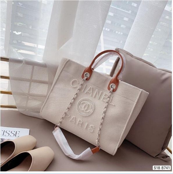 the most beautiful pearl embroidery beach bag of the year, the large capacity can be used for traveling bags
the most beautiful pearl embroidery beach bag of the year, the large capacity can be used for traveling bags
