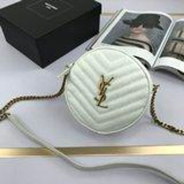 round crossbody bag decorated with chevron quilted overstitching and metal initials, featuring a chain and leather shoulder strap
round crossbody bag decorated with chevron quilted overstitching and metal initials, featuring a chain and leather shoulder strap
