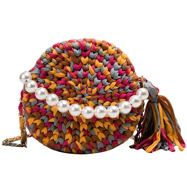 new small fragrance single shoulder messenger bag hand-woven fashion pearl chain small round bag
new small fragrance single shoulder messenger bag hand-woven fashion pearl chain small round bag