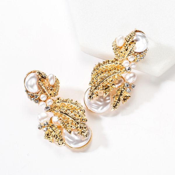 exaggerated temperament alloy leaves imitation pearl diamond flower fruit personalized earrings female fashion, Golden
exaggerated temperament alloy leaves imitation pearl diamond flower fruit personalized earrings female fashion, Golden