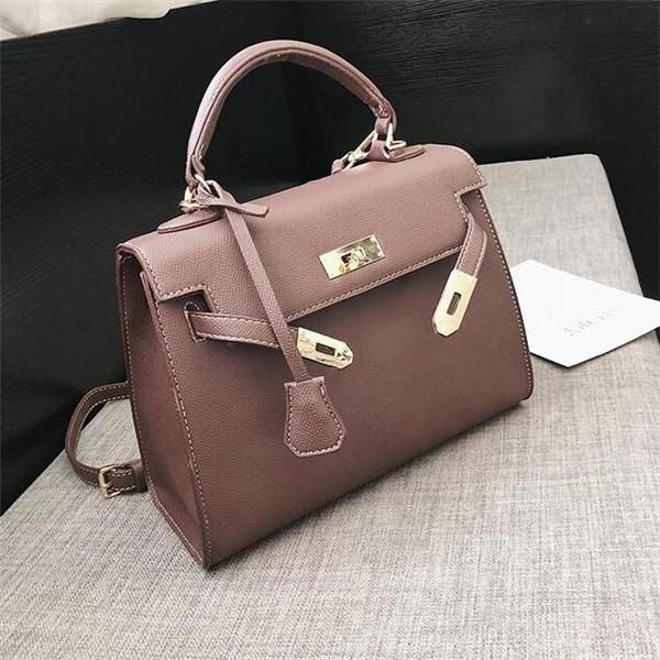 2020 brand women handbags elegant atmosphere handprint handbag Joker solid color women handbags buckle decorative fashion Messenger bag
2020 brand women handbags elegant atmosphere handprint handbag Joker solid color women handbags buckle decorative fashion Messenger bag