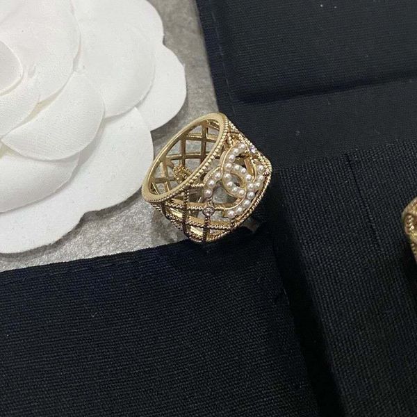 high-end french luxury fashion week european and american hollow diamond lattice pattern woven pearl wide face small fragrance ring 003, Silver
high-end french luxury fashion week european and american hollow diamond lattice pattern woven pearl wide face small fragrance ring 003, Silver