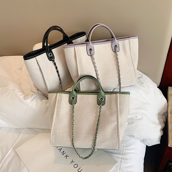 2020 new korean style all-match canvas chain shoulder messenger women's hand canvas handbag large capacity woven portable tote bag 
2020 new korean style all-match canvas chain shoulder messenger women's hand canvas handbag large capacity woven portable tote bag