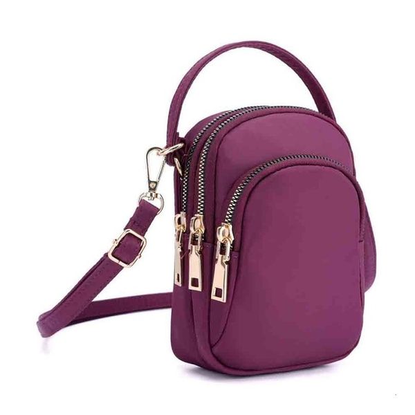 womens bag lightweight nylon mobile phone headset shoulder messenger taschen women bolsa masculina sac femme fashion bolsas de mujer
womens bag lightweight nylon mobile phone headset shoulder messenger taschen women bolsa masculina sac femme fashion bolsas de mujer