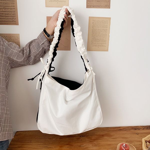 ladies messenger bag literary simple large capacity solid color drawstring wide shoulder strap canvas shoulder bag cross
ladies messenger bag literary simple large capacity solid color drawstring wide shoulder strap canvas shoulder bag cross