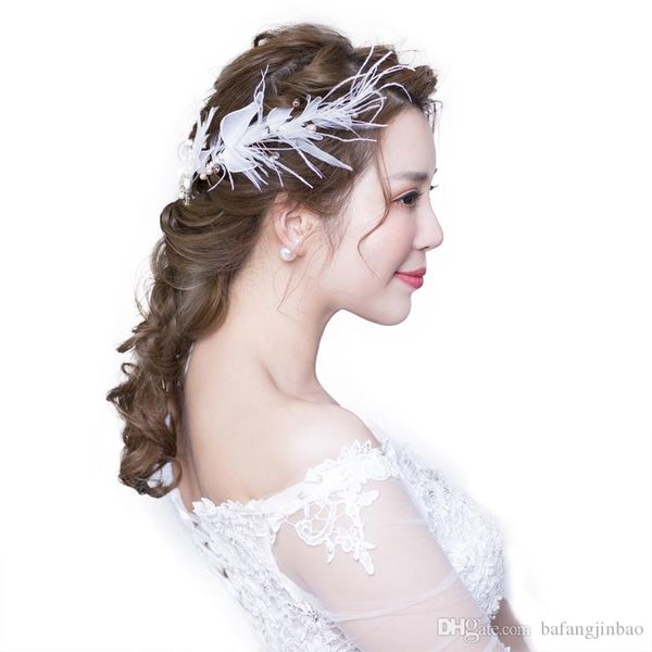 Bride headdress simple feather hair decoration super fairy sweet wedding hair decoration
Bride headdress simple feather hair decoration super fairy sweet wedding hair decoration