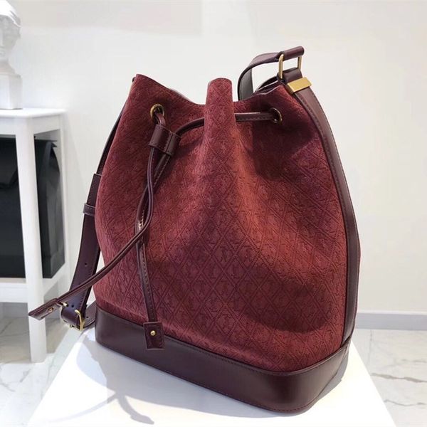new lady bucket bag 7a high-end custom quality fashion style gold metal accessories with long shoulder strap
new lady bucket bag 7a high-end custom quality fashion style gold metal accessories with long shoulder strap