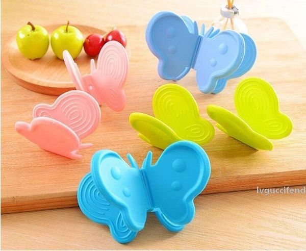 ale kitchen accessories soft insulation butterfly shaped clip microwave oven mitt pot holder cute heat-resistant plate dishes bowl clips 
ale kitchen accessories soft insulation butterfly shaped clip microwave oven mitt pot holder cute heat-resistant plate dishes bowl clips