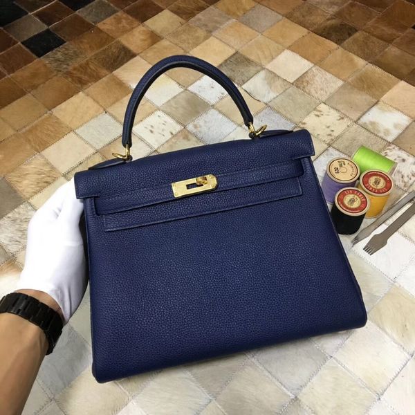 whosale half handmade 25cm navy blue togo leather design purse, wax thread, have both gold and silver hardware,contact me for details
whosale half handmade 25cm navy blue togo leather design purse, wax thread, have both gold and silver hardware,contact me for details