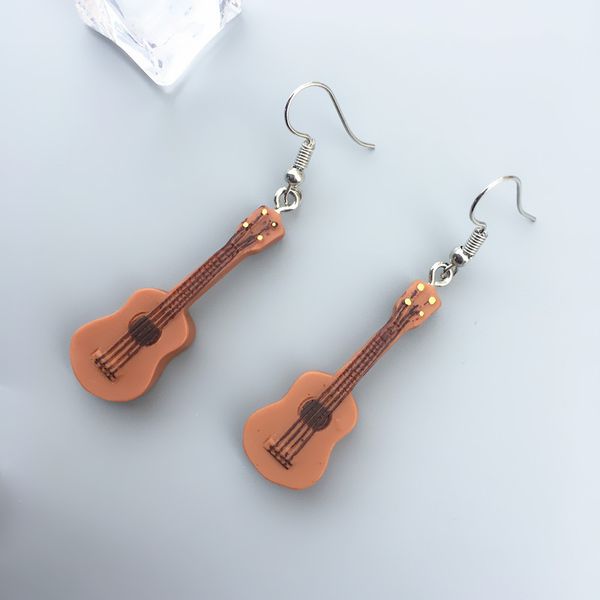 funny punk guitar instrument drop earrings women's fashion creative hand-made diy earless ear clip jewelry birthday gift, Silver
funny punk guitar instrument drop earrings women's fashion creative hand-made diy earless ear clip jewelry birthday gift, Silver