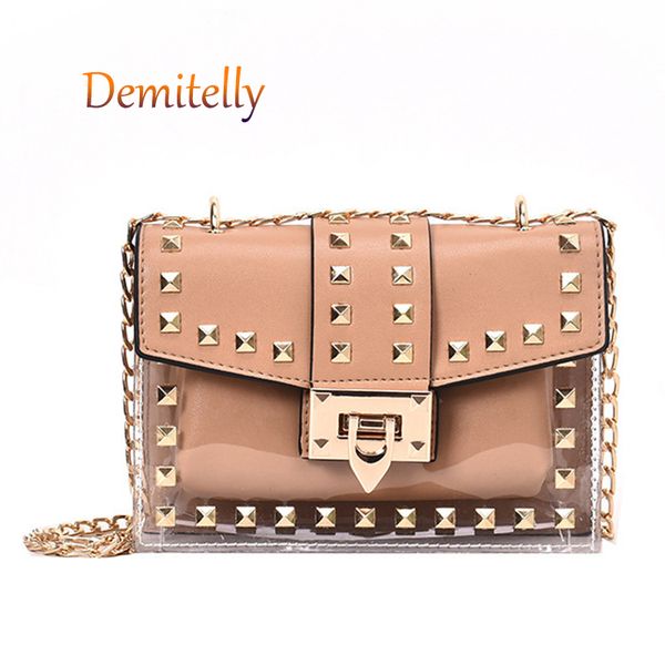 the new transparent women's handbag is a metal rivet decoration shoulder messenger bag luxury ladies tote bag wallet clutch
the new transparent women's handbag is a metal rivet decoration shoulder messenger bag luxury ladies tote bag wallet clutch