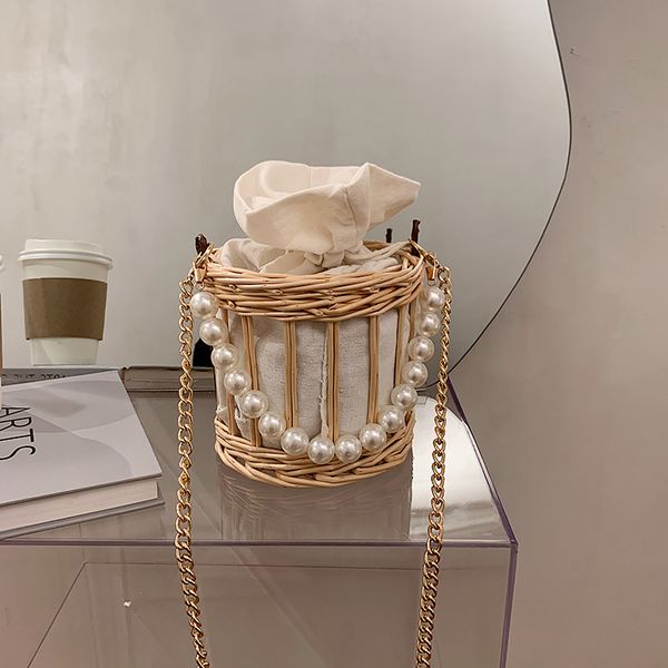 бамбук переплетения bucket bag 2020 лето цепи сумки на ремне, pearl tote высокого качества сумки crossbody сумка сумки для женщин
бамбук переплетения bucket bag 2020 лето цепи сумки на ремне, pearl tote высокого качества сумки crossbody сумка сумки для женщин