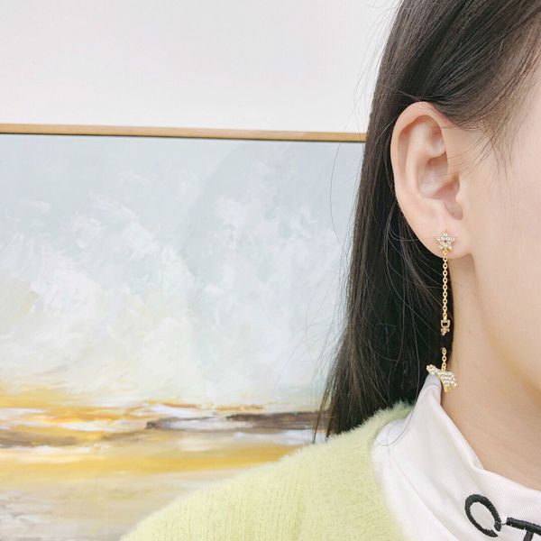 d family/di family rhinestone star long tassel earrings female senior sense web celebrity giraffe earrings of the same style, White
d family/di family rhinestone star long tassel earrings female senior sense web celebrity giraffe earrings of the same style, White