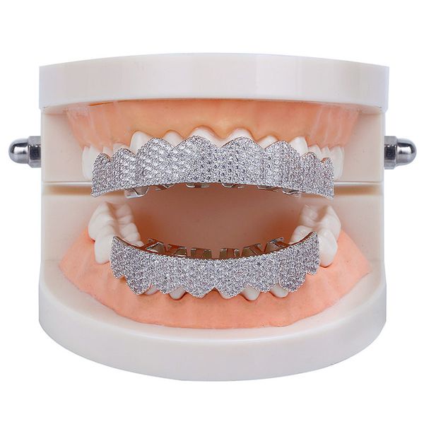 2020 micro pave cubic zirconia silver gold color teeth grills hiphop rocker halloween iced out caps bottom fang grills set bling teeth
2020 micro pave cubic zirconia silver gold color teeth grills hiphop rocker halloween iced out caps bottom fang grills set bling teeth
