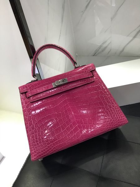 wholesale shiny crocodile leather fuchsia brand bag,fully handmade,wax thread,by order,have gold and silver hardware,can make size28,32cm
wholesale shiny crocodile leather fuchsia brand bag,fully handmade,wax thread,by order,have gold and silver hardware,can make size28,32cm