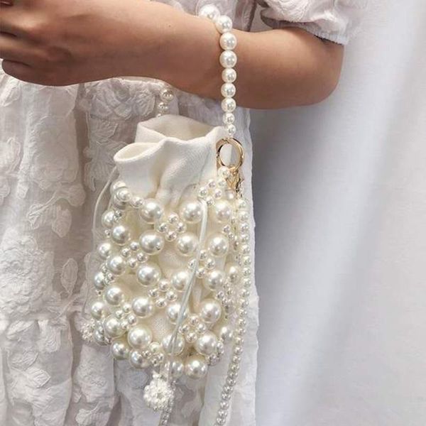 2020 pearl bucket bag cotton canvas inner bag metal handbag beaded totes vintage designer purses women bags
2020 pearl bucket bag cotton canvas inner bag metal handbag beaded totes vintage designer purses women bags
