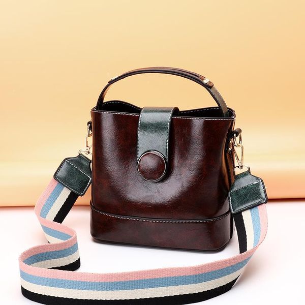 fashion casual wide shoulder portable bucket bag solid color wild shoulder messenger bag handbag women designer
fashion casual wide shoulder portable bucket bag solid color wild shoulder messenger bag handbag women designer