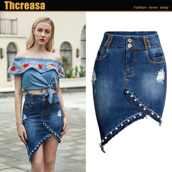 designer casual girl short skirt new irregular beaded pearl denim with buttocks up and buttocks wrapped skirt middle skirt wholesale
designer casual girl short skirt new irregular beaded pearl denim with buttocks up and buttocks wrapped skirt middle skirt wholesale