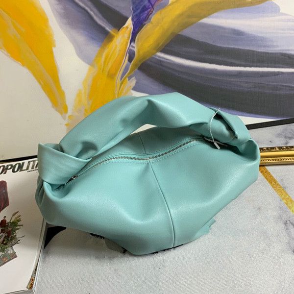 new leather candy color cloud knotting bag ox horn bag portable women's bag in the early autumn of 2020
new leather candy color cloud knotting bag ox horn bag portable women's bag in the early autumn of 2020