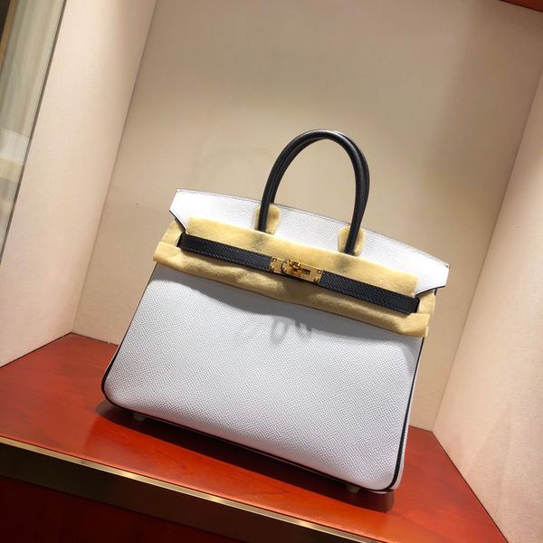wholesale,handmade original epsom leather white+black 2tones brand bag30cm,wax thread,have gold and silver hardware,by order 10-15days
wholesale,handmade original epsom leather white+black 2tones brand bag30cm,wax thread,have gold and silver hardware,by order 10-15days