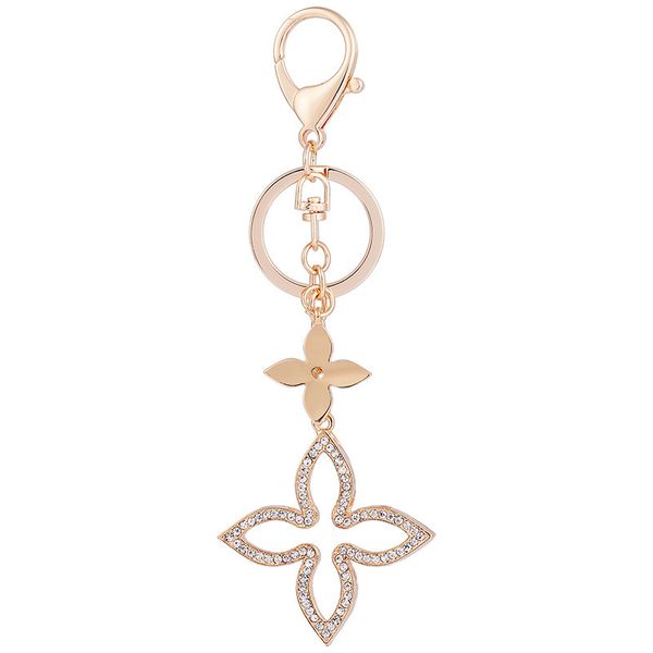 version of the creative four-leaf clover keychain car key chain pendant fashion exquisite women's bag hanging decoration keyring, Silver
version of the creative four-leaf clover keychain car key chain pendant fashion exquisite women's bag hanging decoration keyring, Silver
