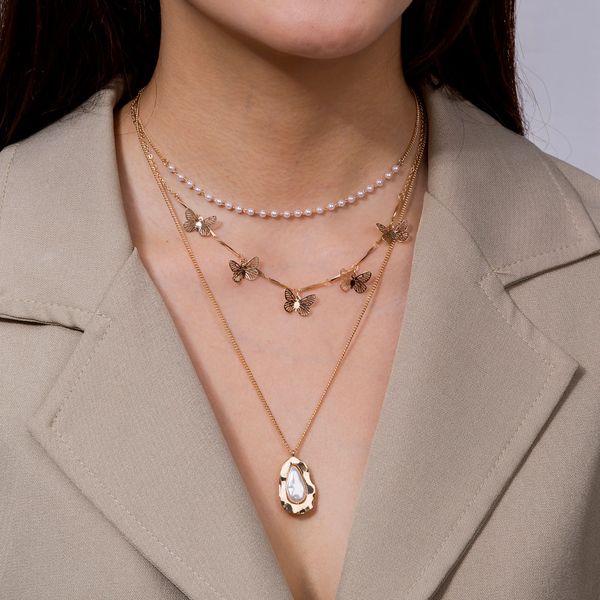 fashionable irregular metal pendant multi layers necklace hollow butterfly with imitation pearl chockers for women jewelry, Silver
fashionable irregular metal pendant multi layers necklace hollow butterfly with imitation pearl chockers for women jewelry, Silver
