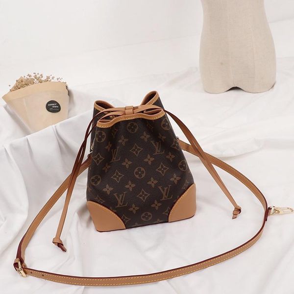 new arrival womens leather bucket bag vintage classic drawstring shoulder bag trend style lady messenger crossbody bags bolsa de hombro
new arrival womens leather bucket bag vintage classic drawstring shoulder bag trend style lady messenger crossbody bags bolsa de hombro