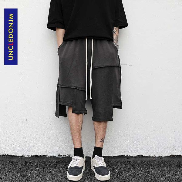 uncledonjm irregular trousers stitching shorts men's drawstring elastic waist half pants hip hop loose shorts nc-9829, White;black 
uncledonjm irregular trousers stitching shorts men's drawstring elastic waist half pants hip hop loose shorts nc-9829, White;black