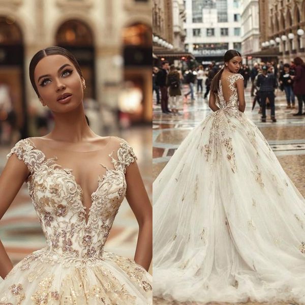 arabic ball gown wedding dresses cap sleeves emboridery lace beads bridal gowns sheer neck sweep train vestidos, White
arabic ball gown wedding dresses cap sleeves emboridery lace beads bridal gowns sheer neck sweep train vestidos, White